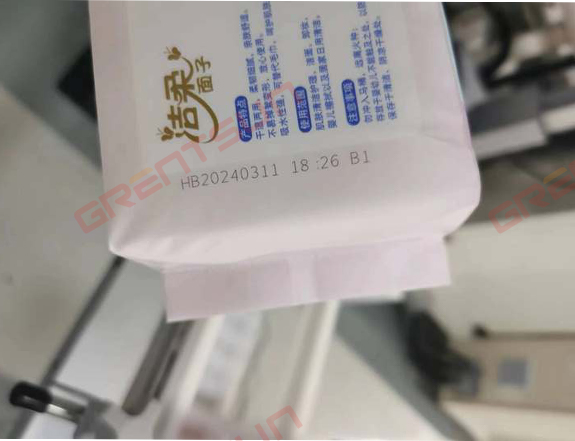 紫外激光噴碼機在洗臉巾生產(chǎn)日期噴碼中的應(yīng)用